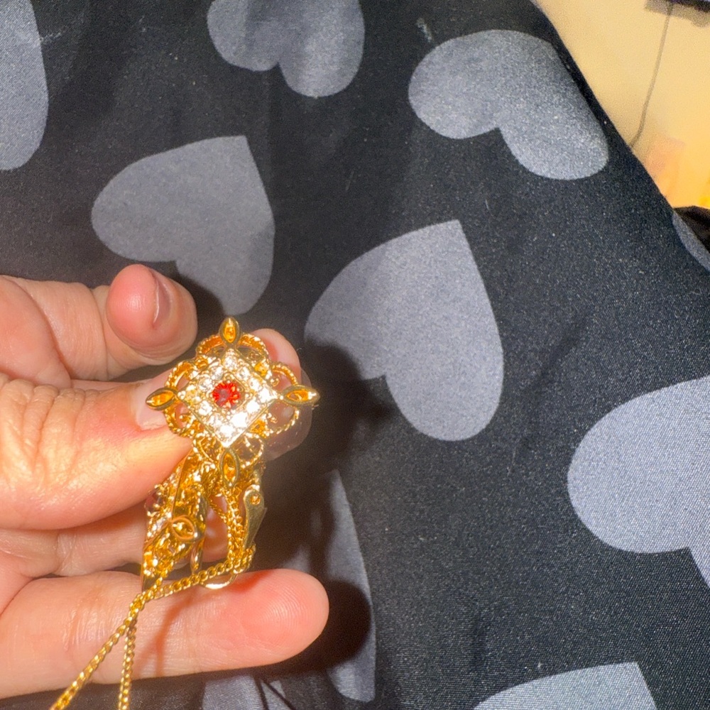 Gold-Tone Floral Pendant Necklace with Red Accent